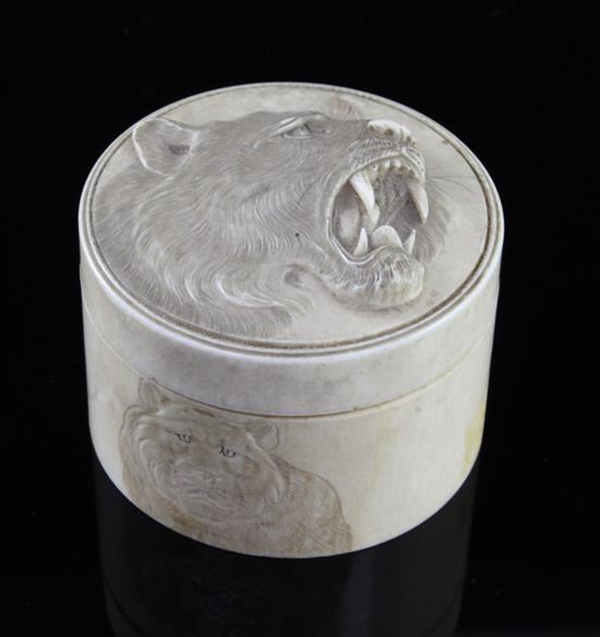 A Japanese ivory circular box and cover, early 20th century, diameter 9.5cm, re-glued